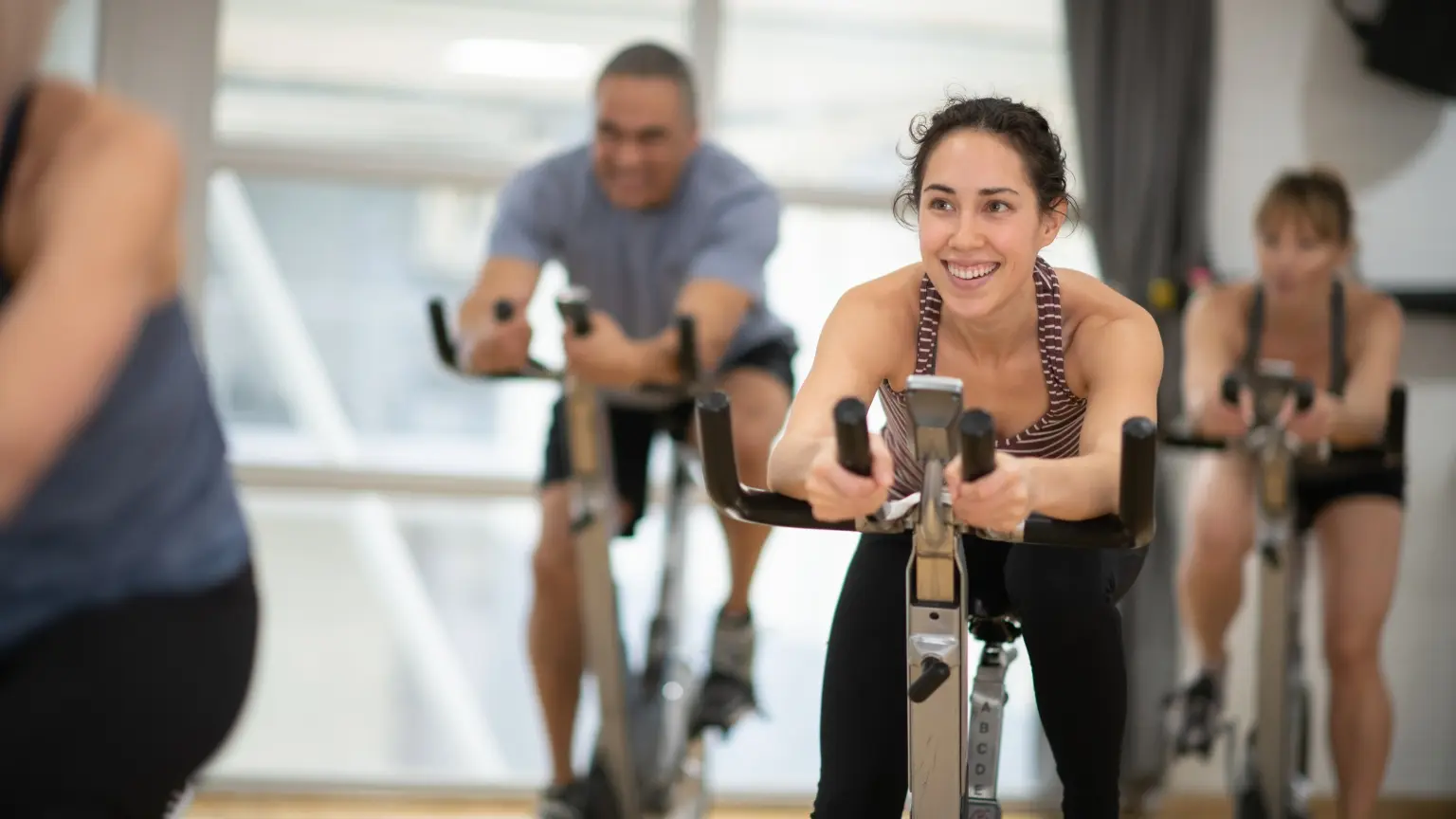 Happy people who are working out.