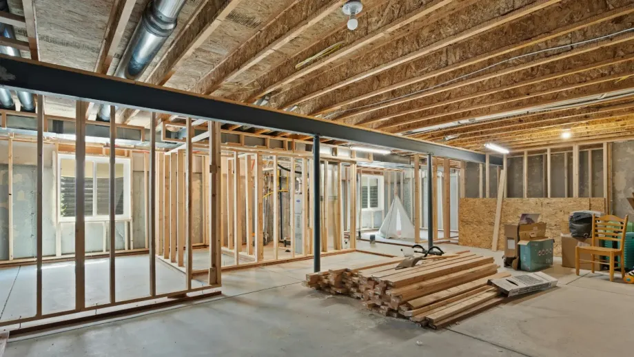Interior of a new building. The interior of the walls is exposed.